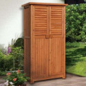 Armoire de balcon haute en bois. Ce meuble de balcon PÉPE, ou armoire de terrasse est lasuré brun